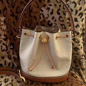 Tory Burch, T Monogram embossed patent leather bucket bag